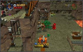 Kolejne włócznie znajdziesz: na górze lokacji [1] (ponownie musisz wykopać klocka i zniszczyć go bazooką) oraz w pomieszczeniu w lewym górnym narożniku, do którego dotrzesz po przestawieniu przełącznika [2] na ścianie z lewej - Górska jaskinia (bonus) | Świątynia Zagłady | LEGO Indiana Jones 2 - LEGO Indiana Jones 2: The Adventure Continues - poradnik do gry