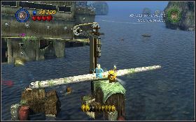 Następnie przeskocz na wysepkę z prawej i rzuć mieczem w linę [1] nad wielkim potworem - Zamieszanie z ciastem krabowym (bonus) | Ostatnia Krucjata - LEGO Indiana Jones 2: The Adventure Continues - poradnik do gry