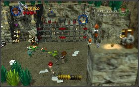 Rozpraw się z przeciwnikami na dole, a potem wejdź po drabinie i załatw żołnierza na górze [1] - Lotnisko w Berlinie (bonus) | Ostatnia Krucjata | LEGO Indiana Jones 2 - LEGO Indiana Jones 2: The Adventure Continues - poradnik do gry