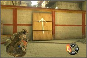 Etap zakończymy podchodząc do strzałki narysowanej na drewnianych płytach w miejscu, z którego wjechał pojazd - [Opis przejścia - Etap 3] cz. 3 - Army of Two: The 40th Day - poradnik do gry