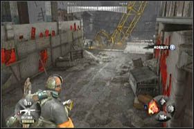 Idąc dalej będziesz zmuszony zeskoczyć na niższy poziom i udać się w kierunku żółtego dźwigu wyburzeniowego - [Opis przejścia - Etap 5] cz. 1 - Army of Two: The 40th Day - poradnik do gry