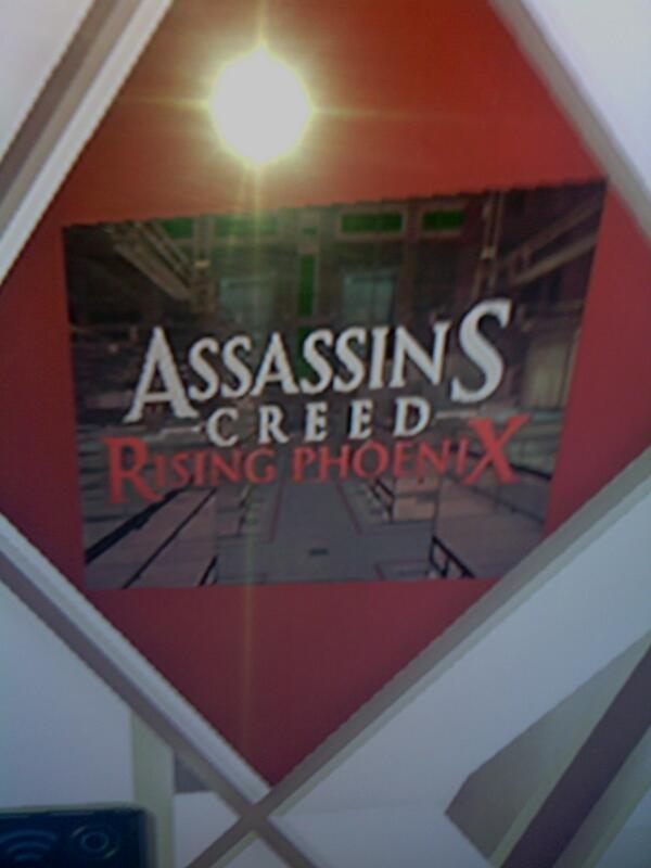 Logo Assassin's Creed: Rising Phoenix w siedzibie Abstergo (źródło: iGo Gaming)