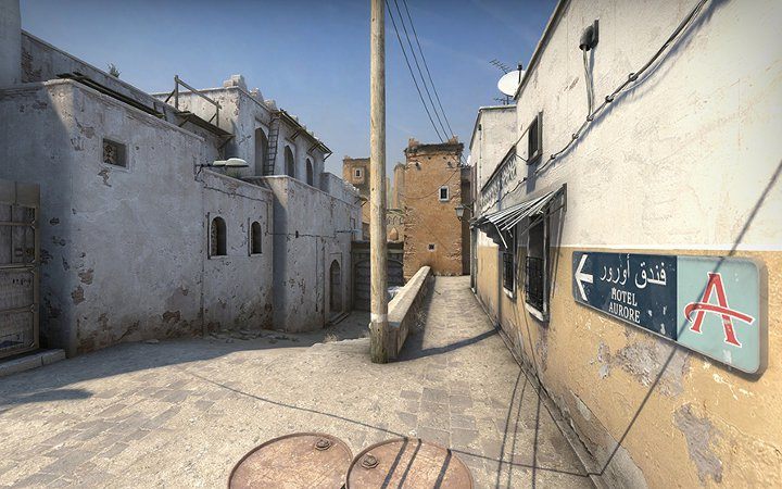 Znaki prowadzące do poszczególnych miejsc podłożenia bomb teraz bardziej wpasowują się w otoczenie. - Odświeżona mapa Dust 2 oficjalnie w Counter-Strike: Global Offensive - wiadomość - 2017-10-19