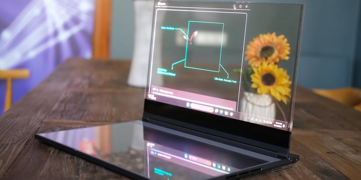 Jak możecie zobaczyć, stojące za ekranem słoneczniki są dobrze widoczne, dzięki czemu można je łatwo szkicować. Źródło: The Verge. - Lenovo prezentuje laptop rodem z filmów sci-fi, wyposażony w przeźroczysty ekran i dotykową klawiaturę - wiadomość - 2024-02-26